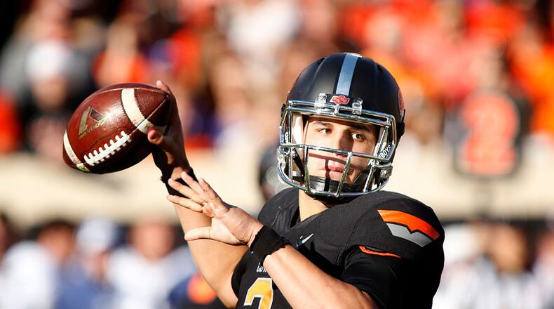 STILLWATER, OK - NOVEMBER 7 : Quarterback Mason Rudolph #2 of the Oklahoma State Cowboys looks to throw against the TCU Horned Frogs November 7, 2015 at Boone Pickens Stadium in Stillwater, Oklahoma. The Cowboys defeated the Horned Frogs 49-29. (Photo by Brett Deering/Getty Images)