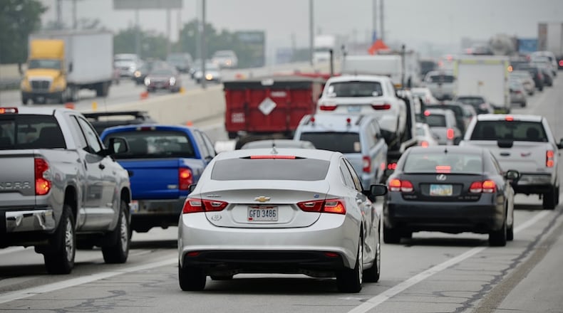 Exhaust from cars is among the biggest contributors to air pollution. Driving less frequently can help to curb the vehicle exhaust emissions that are contributing to air pollution across the globe. MARSHALL GORBY/FILE