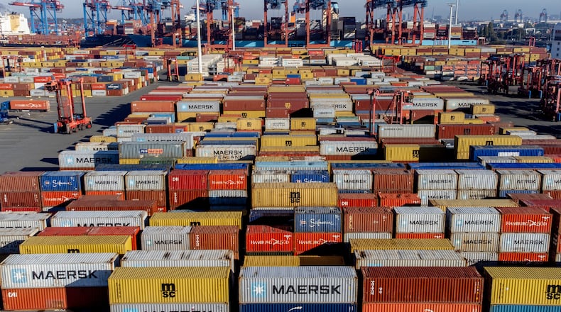 FILE - Containers are piled up in the harbor in Hamburg, Germany, on Oct. 26, 2022. (AP Photo/Michael Probst, file)