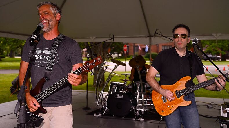 Dave Garwood (left) provides lead vocals and bass while David Hurley plays guitar for Velvet Crush during the first Block Party Concert at Turtle Pond in the Brick Quarters historic district June 24 at Wright-Patterson Air Force Base. Other block parties scheduled by the 88th Force Support Squadron this summer include performances by Stranger, a 1980s cover band, and Parrots of the Caribbean, which is a salute to Jimmy Buffett. U.S. AIR FORCE PHOTO/R.J. ORIEZ