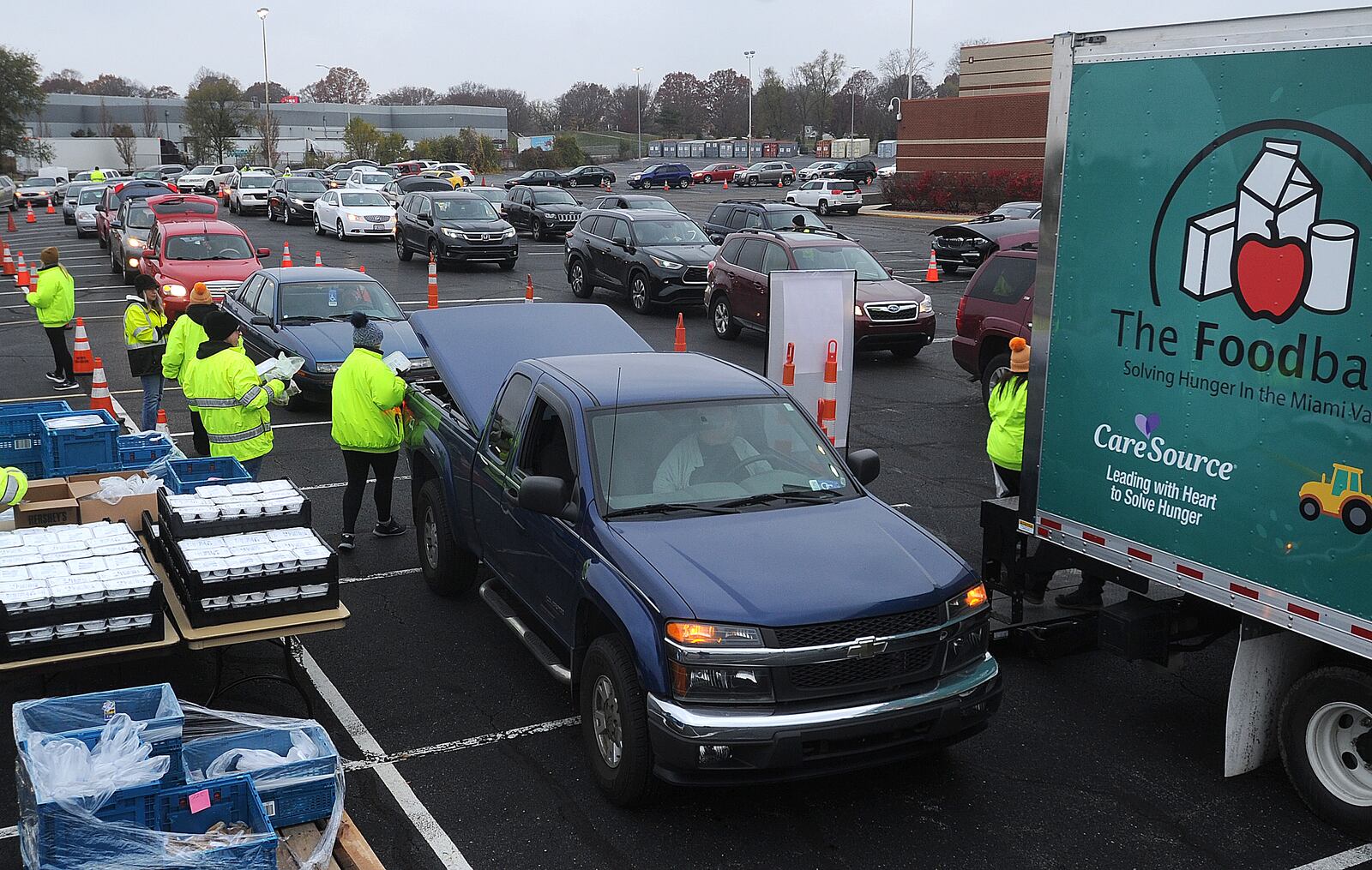 Miami Valley Meals hosted a Turkey Takeaway event at the University of Dayton Arena, Wednesday, Nov. 22, 2023 for those experiencing food insecurity. MARSHALL GORBY\STAFF