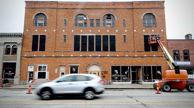 West Main Street in Troy was reopened to traffic early Friday morning, April 19, 2024, in front of the building referred to as the Tavern or IOOF building or Old Courthouse. The road had been closed for almost 10 months during a fight over the future of the damaged building at 112-118 West Main. The owners were boarding some windows Friday until they can be replaced. MARSHALL GORBY \STAFF