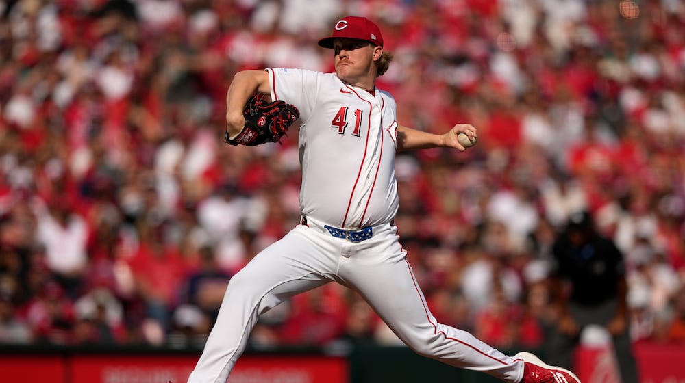 Cincinnati Reds pitcher Andrew Abbott throws during the second inning of an opening-day baseball game against the Boston Red Sox in Cincinnati, Thursday, March 26, 2026. (AP Photo/Carolyn Kaster)