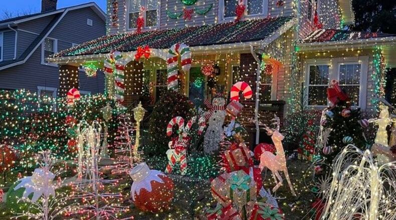 The city and an Oakwood resident are at odds over a large, holiday lights display that this year extends beyond her property. CONTRIBUTED