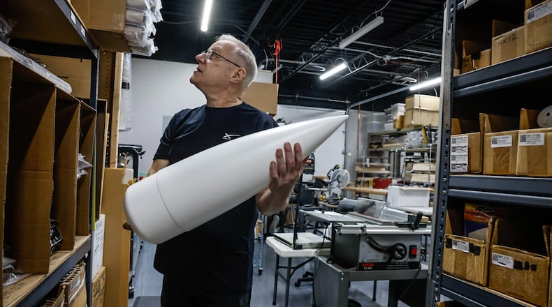 Randy Boadway checks out his supply of model rocket nose cones at his eRockets warehouse on Springfield Street in Dayton on Tuesday, November 19, 2024. Boadway is the founder of eRockets, which ships model rockets throughout the country. JIM NOELKER/STAFF