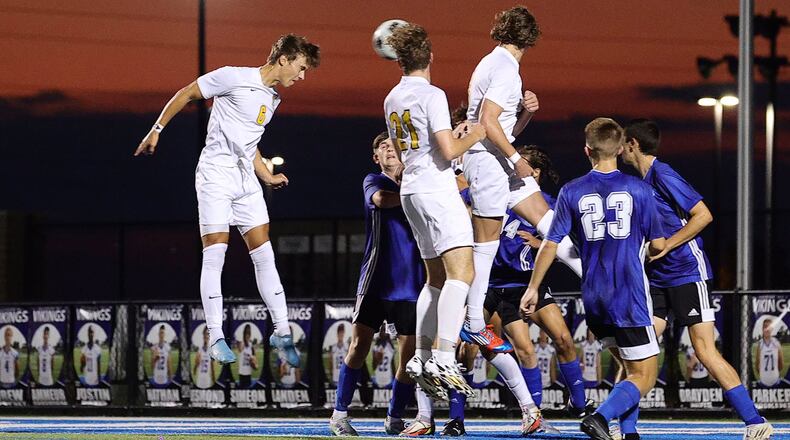 Centerville junior Drew Gaydosh (6) scores on a header this past season against Miamisburg. Gaydosh recently committed to play at Indiana. CONTRIBUTED/Barry Burtenshaw