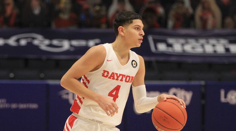 Dayton's Koby Brea brings the ball up the court against George Mason on Saturday, Jan. 2, 2020, at UD Arena. David Jablonski/Staff