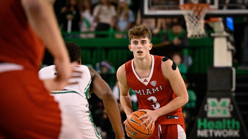 Miami (Ohio) Guard Luke Skaljac (3) looks to pass against Marshall during the second half of an NCAA college Basketball game, Saturday, Feb. 7, 2026, in Huntington, W.Va. (AP Photo/Tyler Evert)
