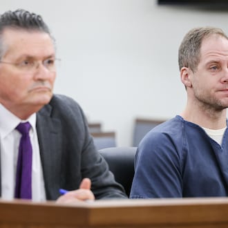 Caleb Flynn listens during an arraignment hearing on Thursday, March 19, 2026, in Miami County Common Pleas Court in Troy. He is seated next to his attorney, L. Patrick Mulligan. BRYANT BILLING / STAFF