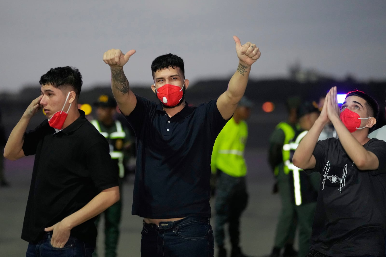 Migrants deported months ago by the United States to El Salvador under the Trump administration's immigration crackdown arrive at Simon Bolívar International Airport in Maiquetia, Venezuela, Friday, July 18, 2025. (AP Photo/Ariana Cubillos)