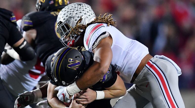 EVANSTON, ILLINOIS - OCTOBER 18: Chase Young #2 of the Ohio State Buckeyes sacks Aidan Smith #11 of the Northwestern Wildcats in the first quarter at Ryan Field on October 18, 2019 in Evanston, Illinois. (Photo by Quinn Harris/Getty Images)