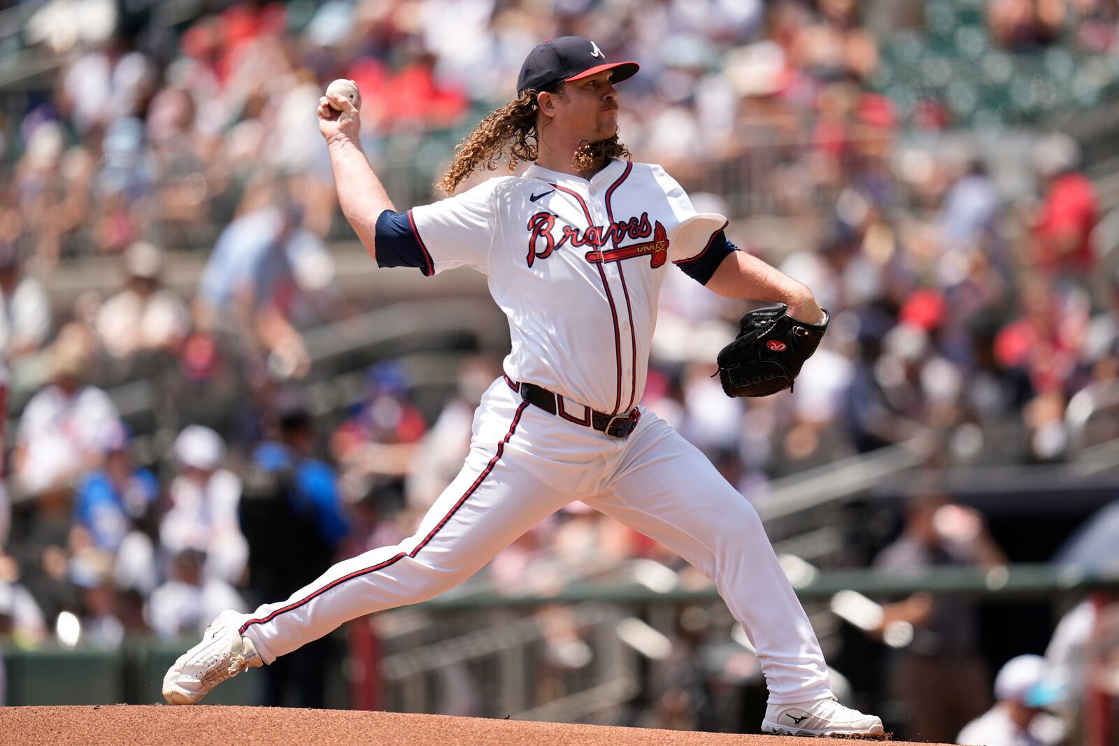 Atlanta Braves pitcher Grant Holmes (66) works in the first inning of a baseball game against the New York Yankees, Sunday, July 20, 2025, in Atlanta. (AP Photo/Mike Stewart)