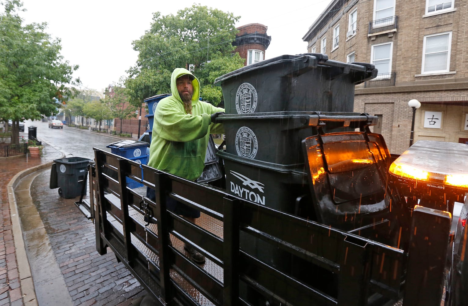 PHOTOS: Crews, party guests work to clean up Oregon District after Gem City Shine block party