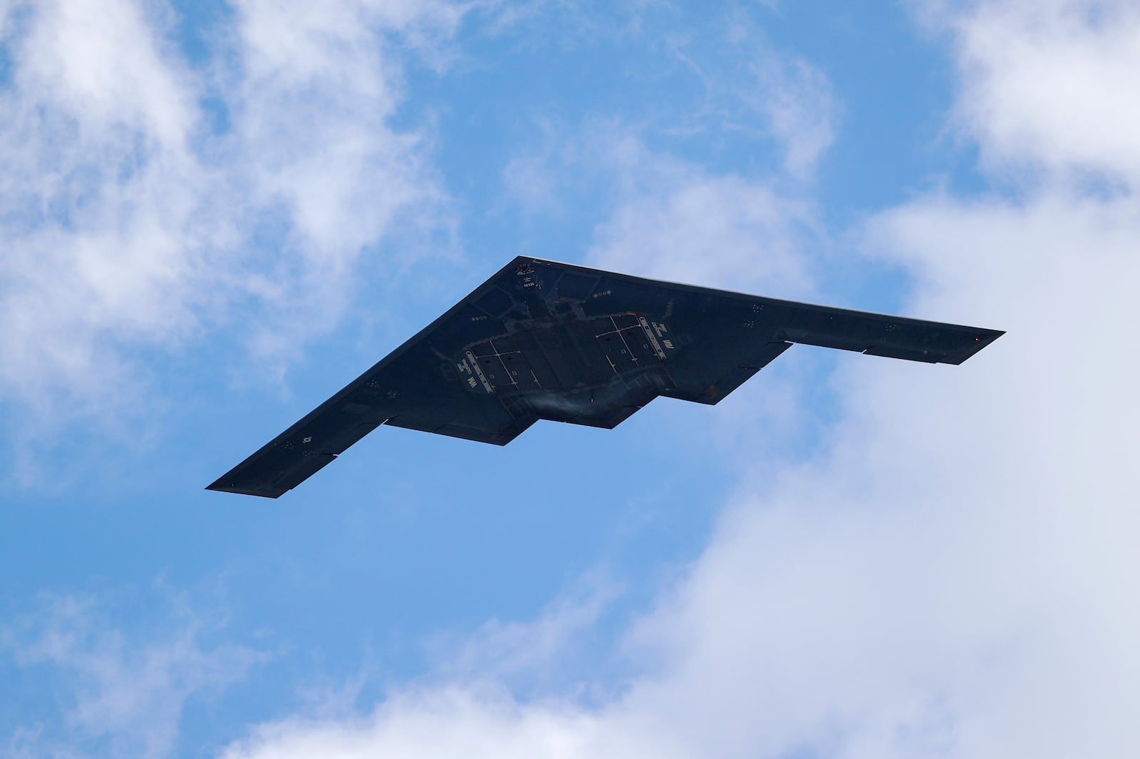 FILE - A B-2 Spirit stealth bomber, assigned to the 509th/131st Bomb Wings out of Whiteman Air Force Base, performs a flyover of Barnes-Jewish Hospital May 8, 2020, in St. Louis. (AP Photo/Jeff Roberson, File)