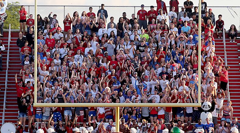 The Fairfield student section cheers as linebacker Aaron McKenzie (33) runs into the end zone for a touchdown after recovering a Northmont fumble during their game at Fairfield Stadium on Friday night. CONTRIBUTED PHOTO BY E.L. HUBBARD