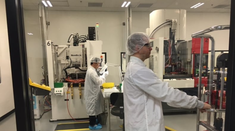 A clean room environment at Dayton’s Norwood Medical, in a photo taken earlier in 2017. The company has more than 1,000 employees working in nine campus buildings. THOMAS GNAU/STAFF