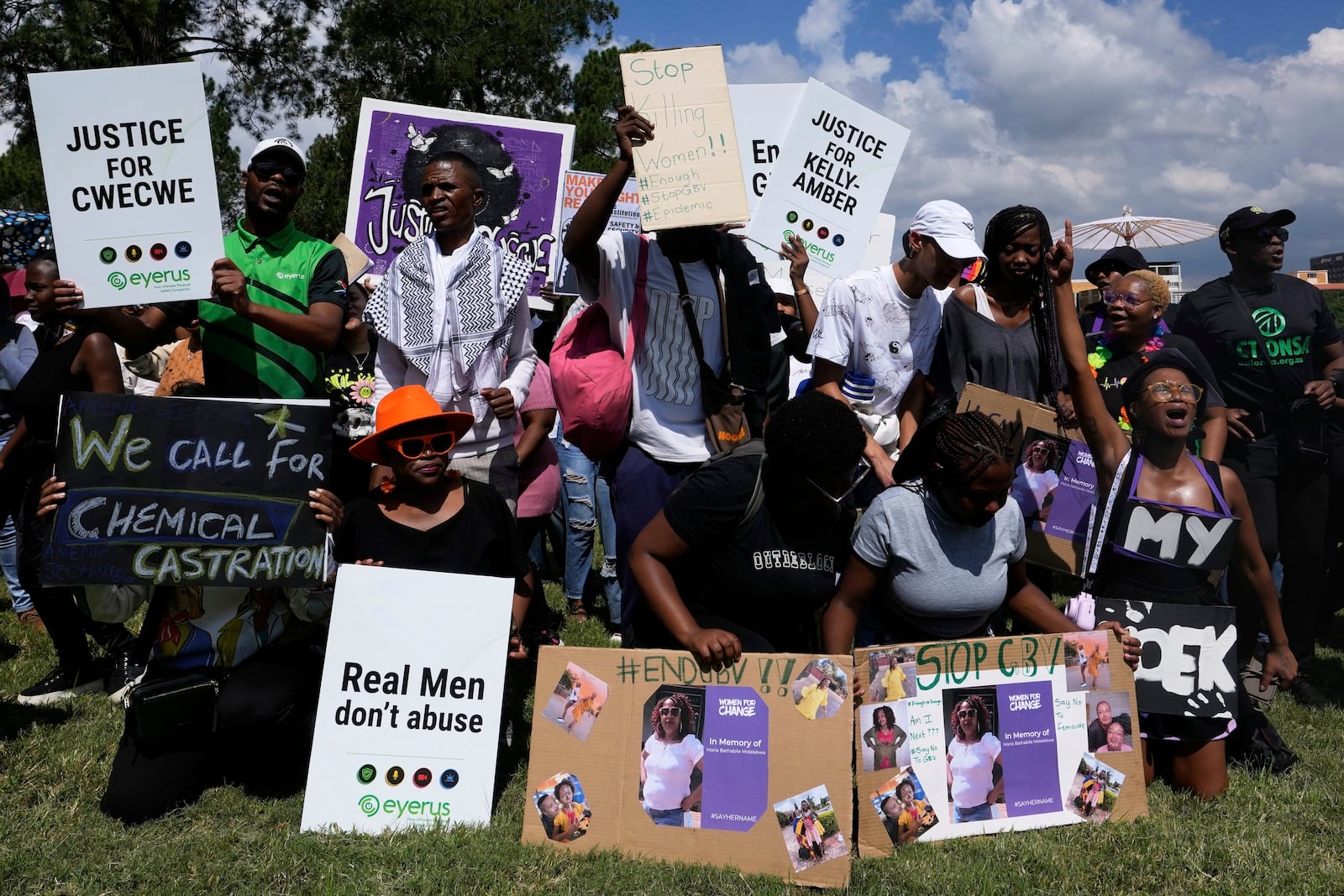 Activist chant slogans during the women's protest and hand over of a petition demanding that gender-based violence and femicide be declared a national disaster, at the Union Buildings in Pretoria, South Africa, Friday, April 11, 2025. (AP Photo/Themba Hadebe)