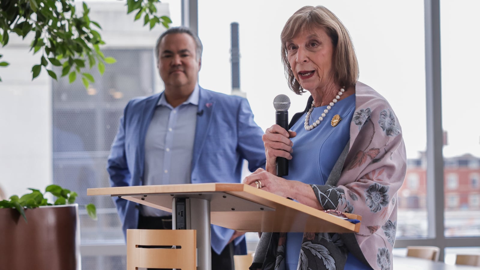 First Lady Fran DeWine speaks while CareSource CEO Erhardt Preitauer looks on during an event at the company's North Main Street office on Wednesday, Feb. 4 in Dayton. CareSource employees raised and donated money to Dolly Parton’s Imagination Library of Ohio. BRYANT BILLING / STAFF