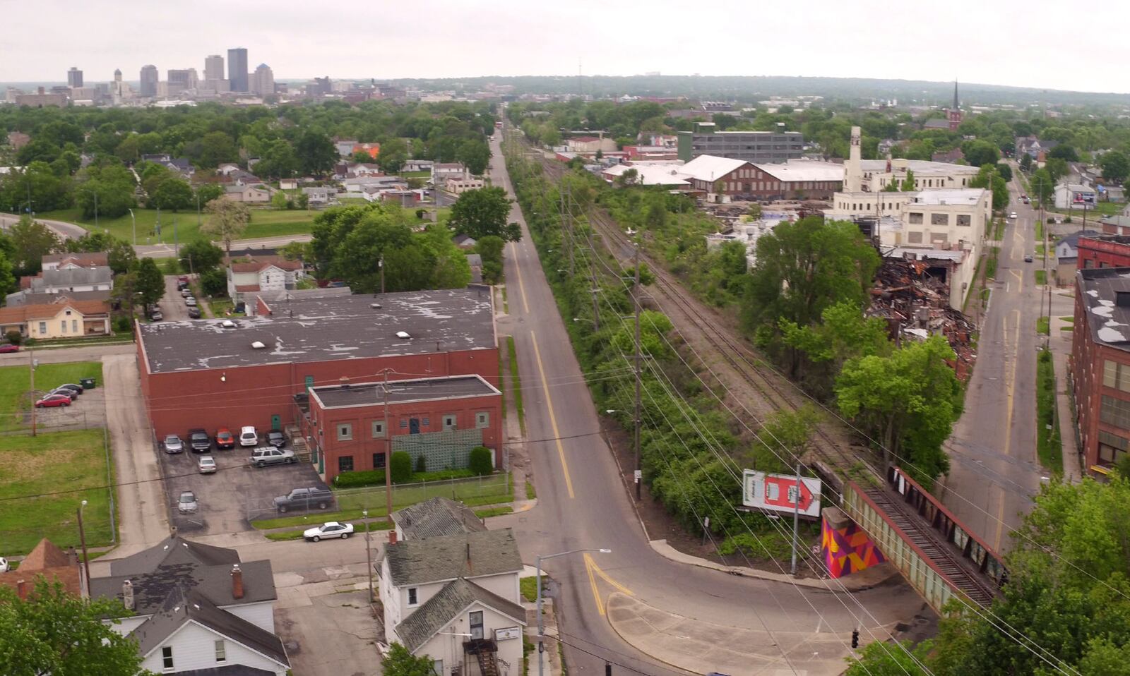 Stretch of unused railway from Linden Ave. to Wayne Ave. includes three bridges and trestles which Dayton wants to keep.   The City of Dayton is seeking to acquire 6.5 miles of railway from Kettering to downtown Dayton for the creation of "high-line" bikeway and parks.   TY GREENLEES / STAFF
