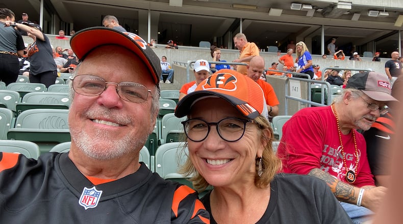 Paul (L) and Betsy at a Bengals game in 2023.
