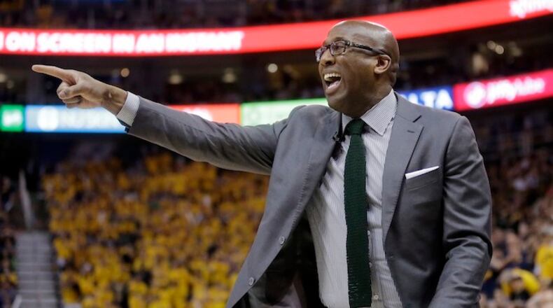 Golden State Warriors interim head coach Mike Brown shouts to his team in the second half during Game 3 of the NBA basketball second-round playoff series against the Utah Jazz Saturday, May 6, 2017, in Salt Lake City. Warriors won 102 - 91. (AP Photo/Rick Bowmer)