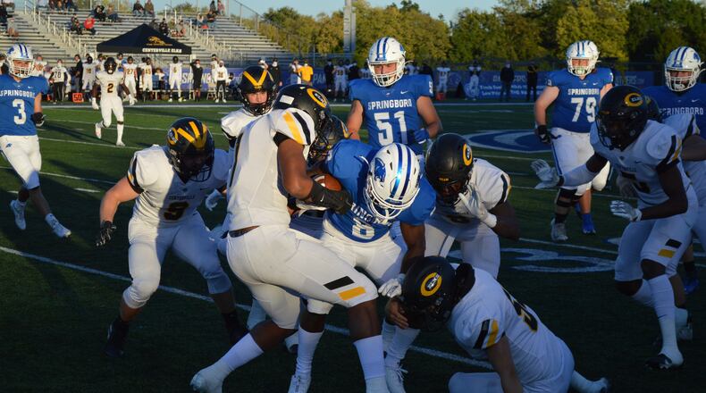 Springboro's Moise Armbruster (8) fights for yards against Centerville on Friday, Sept. 18, 2020. Eric Frantz/CONTRIBUTED