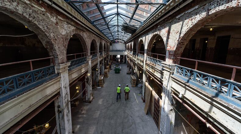Here’s a look at construction progress of the Dayton Arcade’s North Arcade. Recent updates include a new roof, skylight glass and elevator shaft. The Dayton Arcade’s full development plan of nine buildings totaling over 500,000 square feet will recast the Arcade in much the same way it was initially developed in the first decade of the 20th century — with a mix of retail, offices, event space and housing. The second phase, the North Arcade, will include a marketplace retail and restaurant environment as well a 94-room Hilton Garden Inn opening in 2024. TOM GILLIAM / CONTRIBUTING PHOTOGRAPHER