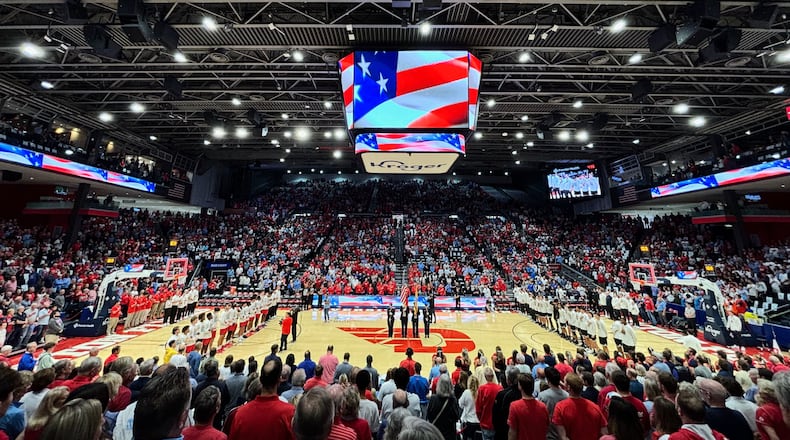 Dayton and Xavier stand for the national anthem before an exhibition game on Sunday, Oct. 20, 2024, at UD Arena. David Jablonski/Staff