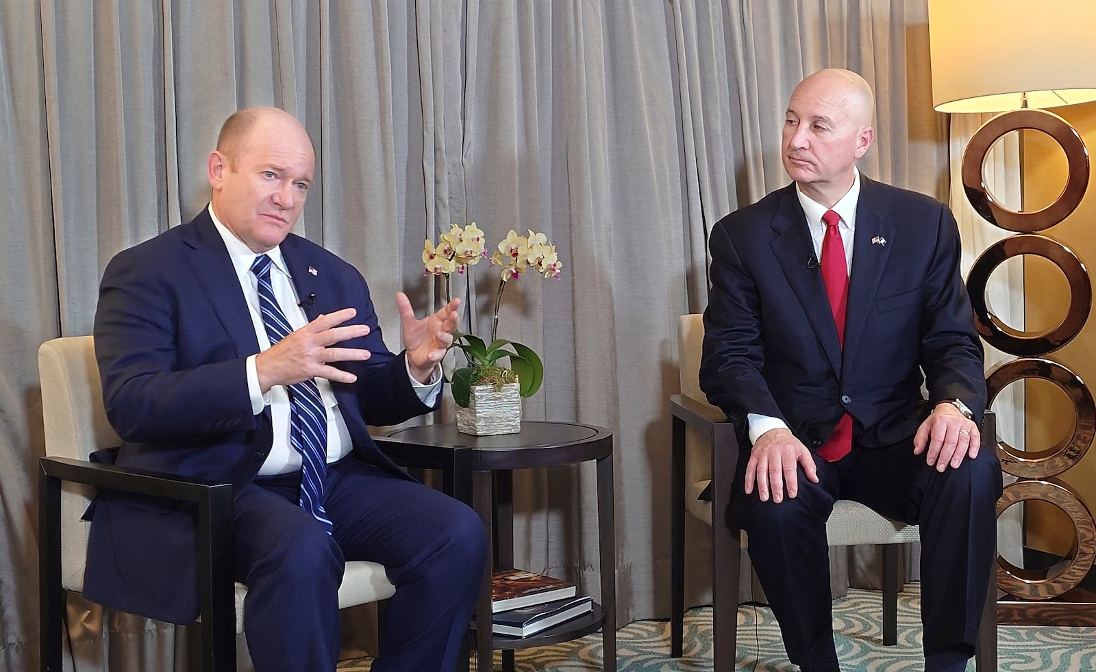 U.S. Senator Pete Ricketts, right, and Chris Coons are interviewed by the Associated Press in Taipei, Taiwan, Thursday, April 17, 2025. (AP Photo/Chiang Ying-ying)