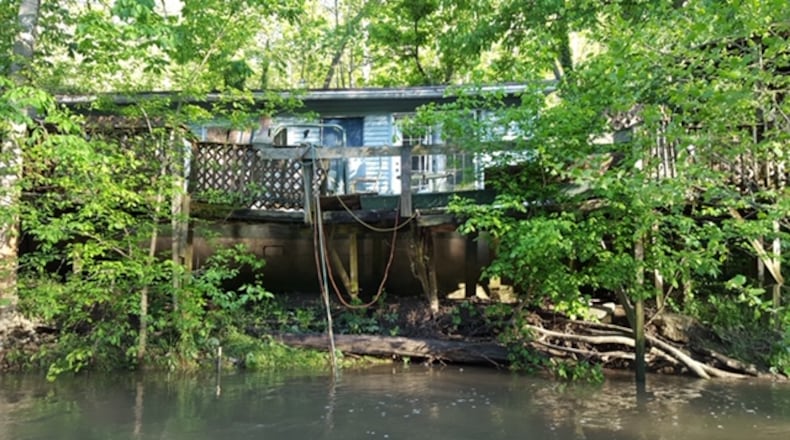 Former home of convicted sex offender Harold Stookey was torn down on Tuesday Oct. 30.
