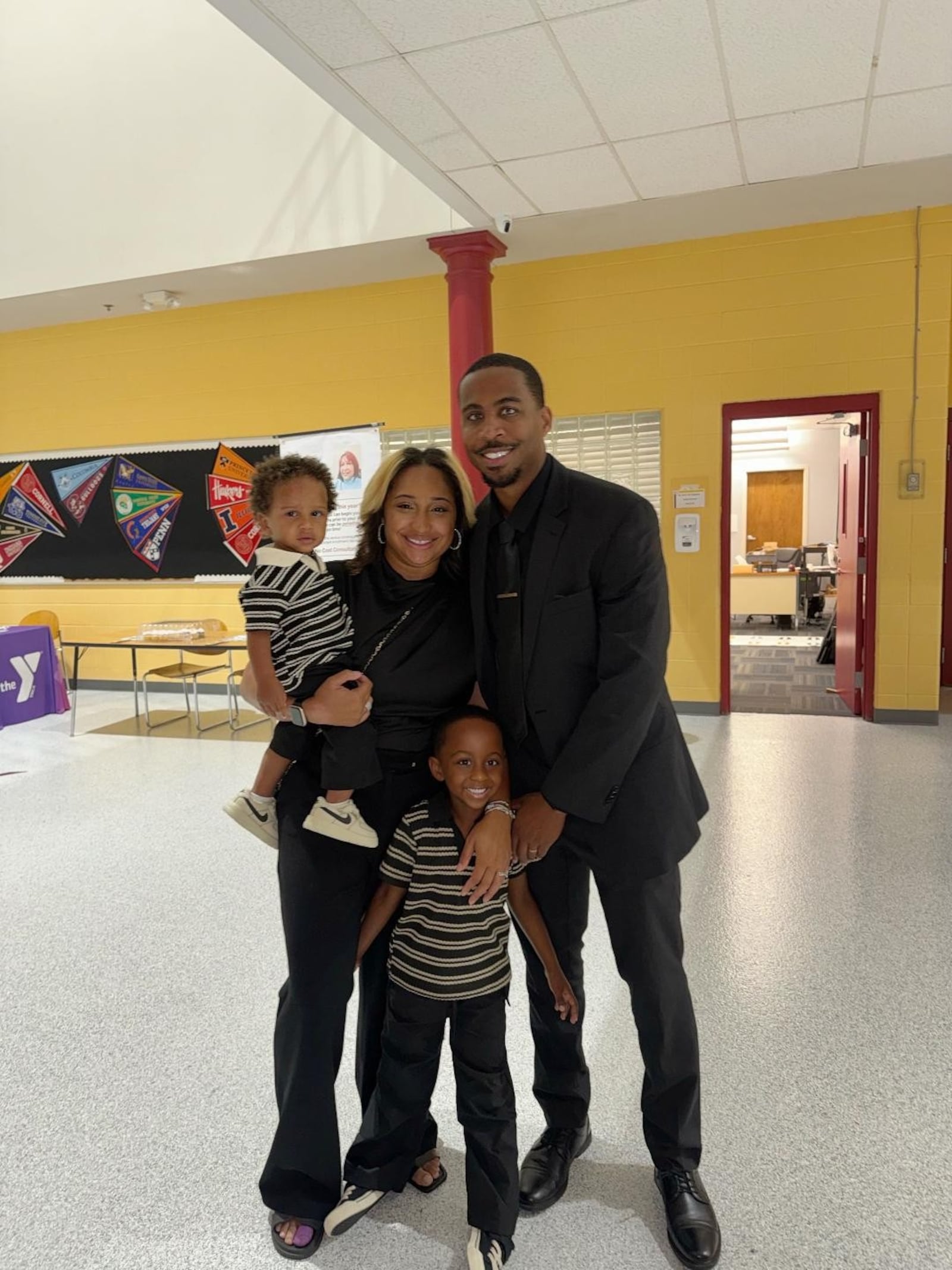 Sean Freeman with his wife, Jordyn Freeman (holding son Saint Freeman), and son Sevyn Freeman. CONTRIBUTED