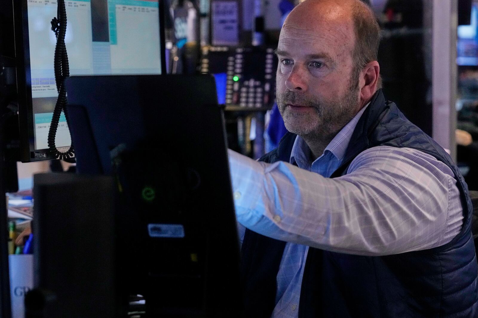 Trader Peter Mancusoi works on the floor of the New York Stock Exchange, Thursday, April 24, 2025. (AP Photo/Richard Drew)