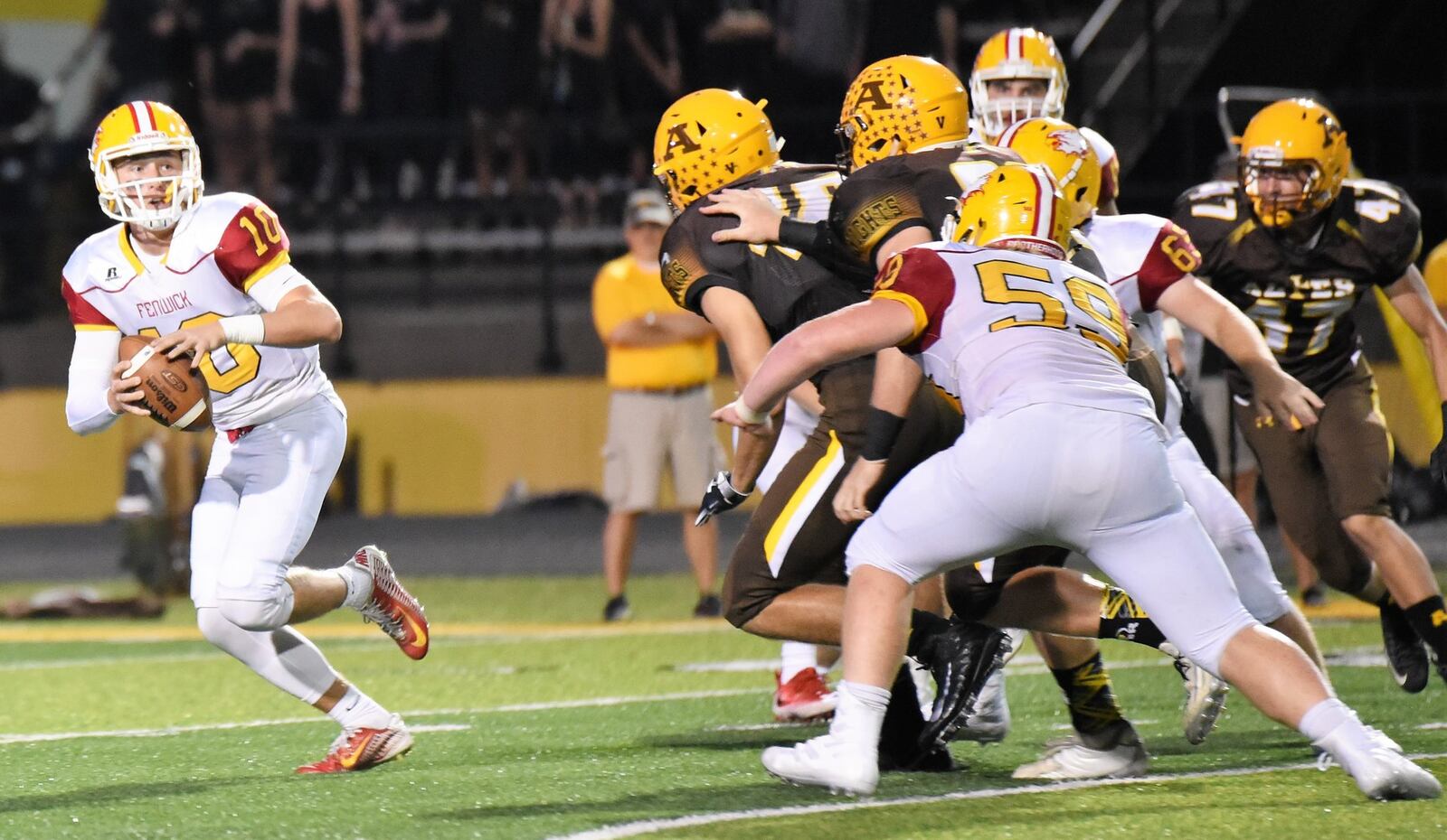 Fenwick quarterback Sully Janeck (10) is under pressure from the Alter defense on Friday night at Centerville Stadium. Janeck threw two touchdown passes, but the Falcons lost 45-20. CONTRIBUTED PHOTO BY ANGIE MOHRHAUS