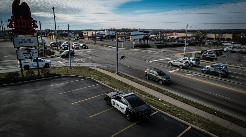 The Huber Heights intersection of Old Troy Pike and Merily Way near I-70 is being monitored by Huber Heights police as of Thursday, Jan. 5, in response to mounting concerns regarding motorists who are turning left onto Merily Way and blocking the intersection. JIM NOELKER/STAFF