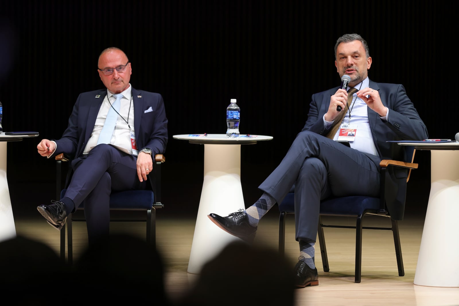 Minister of Foreign Affairs of Bosnia and Herzegovina Elmedin Konakovic, right, speaks next to Minister of Foreign and European Affairs of Croatia Gordan Grlic-Radman during a panel discussion at the NATO Parliamentary Assembly in Dayton, Ohio, Friday, May 23, 2025. (AP Photo/Paul Vernon)