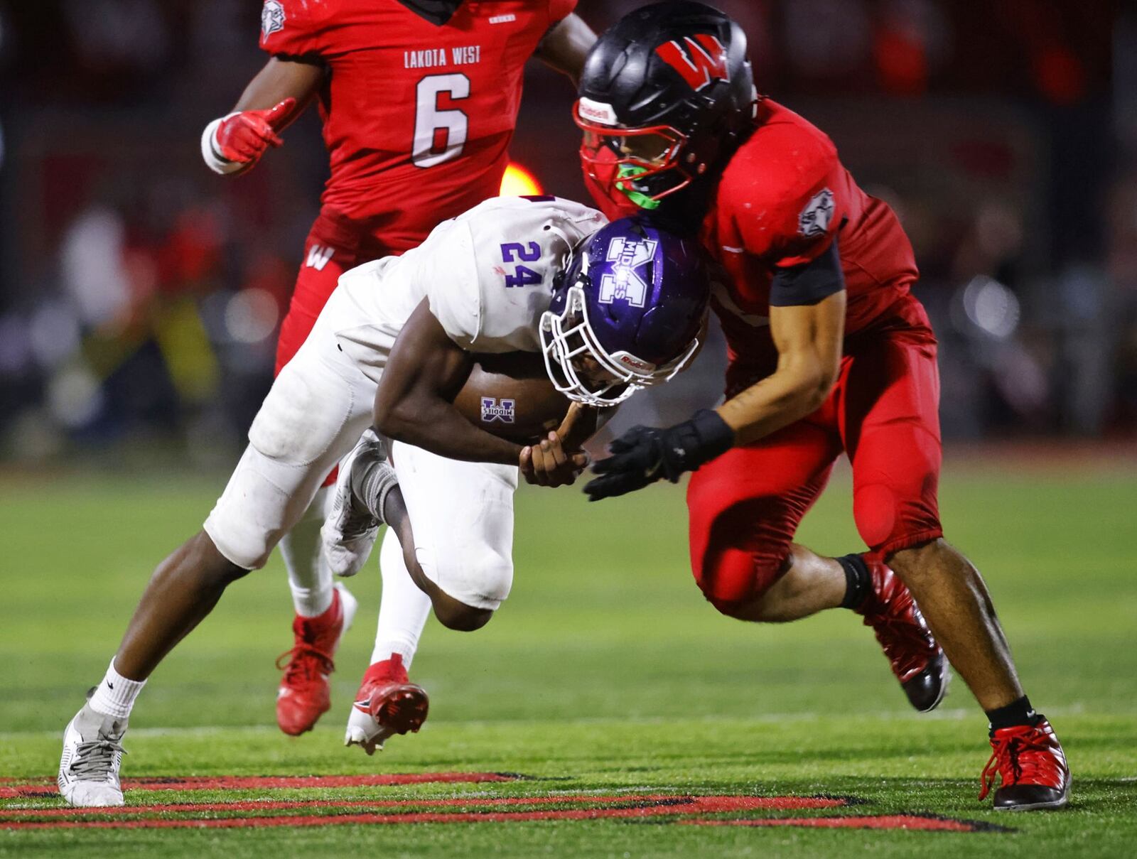 Middletown's Demetrian James carries the ball during their football game against Lakota West Friday, Sept. 26, 2025 at Lakota West High School in West Chester Township. The Firebirds won 27-13 over the Middies. NICK GRAHAM/STAFF