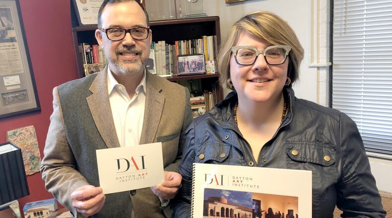 Dayton Art Institute CEO and President Michael Roediger and Alexis Larsen, its external affairs director, unveiled DAI’s new logo at the institution’s annual meeting Thursday, Feb. 28, 2019.