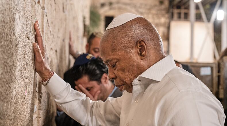 This image released by the Mayor Photography Office shows New York Mayor Eric Adams praying at the Western Wall, in Jerusalem, Israel, Nov. 16, 2025. (Benny Polatseck/Mayoral Photography Office via AP)