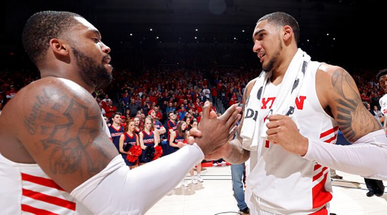 DAYTON, OH - MARCH 07: Obi Toppin #1 and Trey Landers #3 of the Dayton Flyers celebrate after the game against the George Washington Colonials at UD Arena on March 7, 2020 in Dayton, Ohio. Dayton defeated George Washington 76-51 and won the Atlantic 10 Conference regular season title. (Photo by Joe Robbins/Getty Images)
