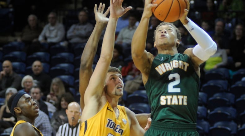 WSU’s Everett Winchester (with ball). Wright State defeated host Toledo 77-69 in a men’s college basketball game on Sat., Dec. 16, 2017. MARC PENDLETON / STAFF