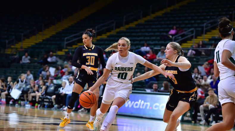 Wright State's Alexis Hutchison looks to drive around a Milwaukee player earlier this season. The Raiders beat the Panthers in the Horizon League quarterfinals on Thursday night. Joe Craven/WSU Athletics