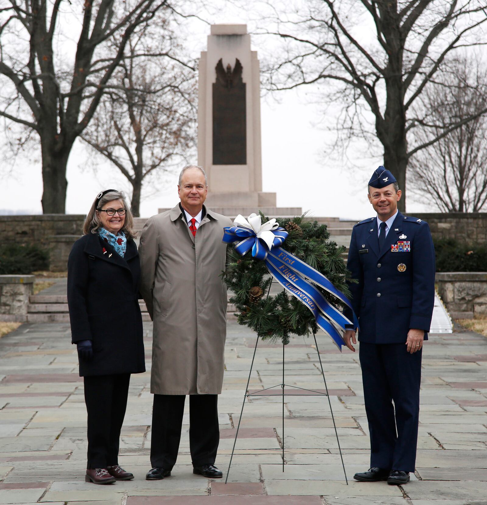 Wright Family descendants Amada Wright Lane and Stephen Wright with Col. Bradley M. McDonald, Commander, Wright-Patterson Air Force Base  at the 114th Anniversary of powered flight on Wright Memorial Hill.  TY GREENLEES / STAFF