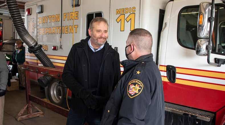 Ohio Attorney General Dave Yost, left, talks with Montgomery County Sheriff Rob Streck Saturday, Jan. 22, 2022, during Yost's drug dropoff day at the Dayton Fire Department's fire station 11.