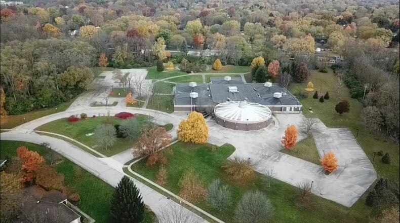 The long-debated future of the former Hithergreen Center in Washington Twp. hinges on the Centerville-Washington Park District’s ability to secure grant funding to demolish the building and turn the property into a park, an answer residents should learn early next month. STAFF/CHUCK HAMLIN