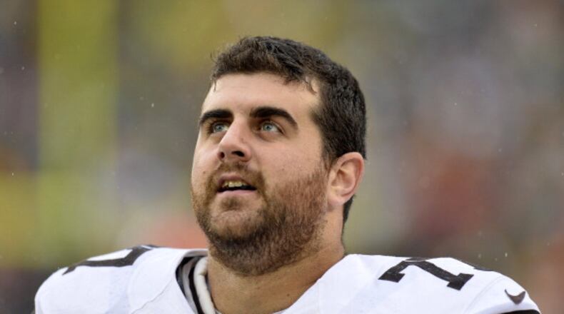 GREEN BAY, WI - OCTOBER 20: John Greco #77 of the Cleveland Browns stands on the sidelines before the game against the Green Bay Packers at Lambeau Field on October 20, 2013 in Green Bay, Wisconsin. The Packers defeated the Browns 31-13. (Photo by Brian Kersey/Getty Images)