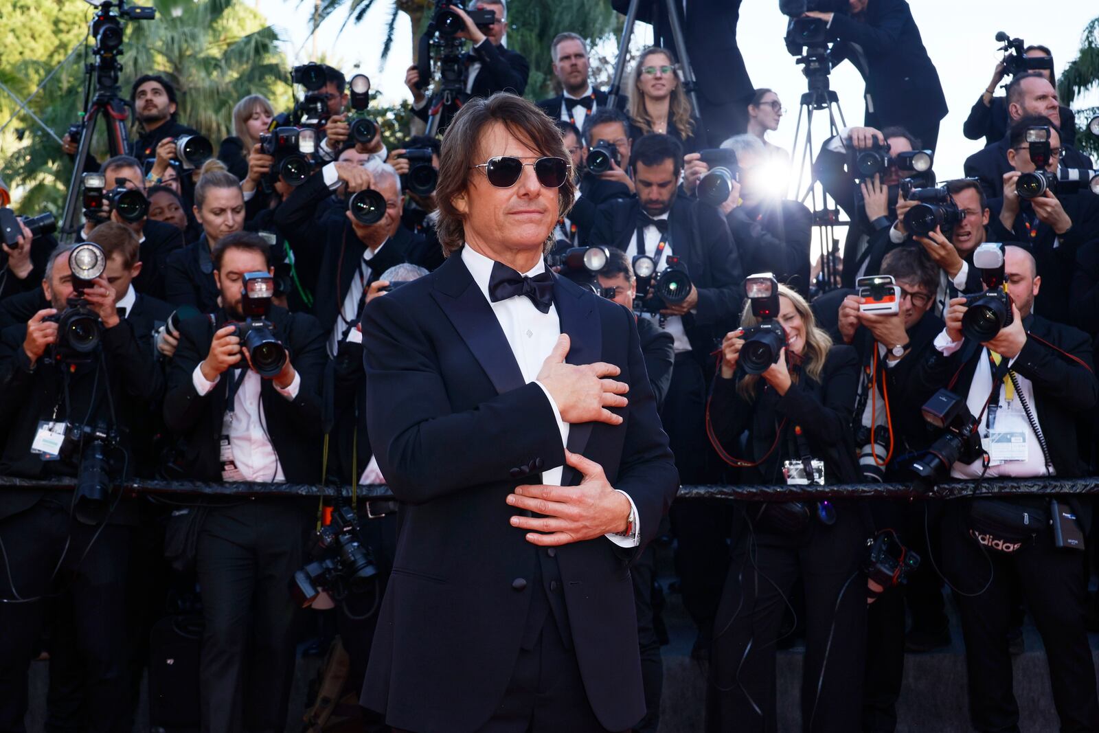 Tom Cruise poses for photographers upon arrival at the premiere of the film 'Mission: Impossible - The Final Reckoning' at the 78th international film festival, Cannes, southern France, Wednesday, May 14, 2025. (Photo by Joel C Ryan/Invision/AP)