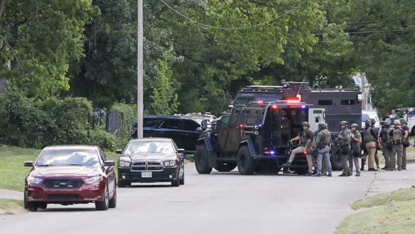 Dayton police asked people to shelter in place as officers, SWAT and hostage negotiation crews responded to an armed suspect at an apartment building in the 3600 block of Delphos Avenue on Monday, Aug. 25, 2025. BRYANT BILLING / STAFF