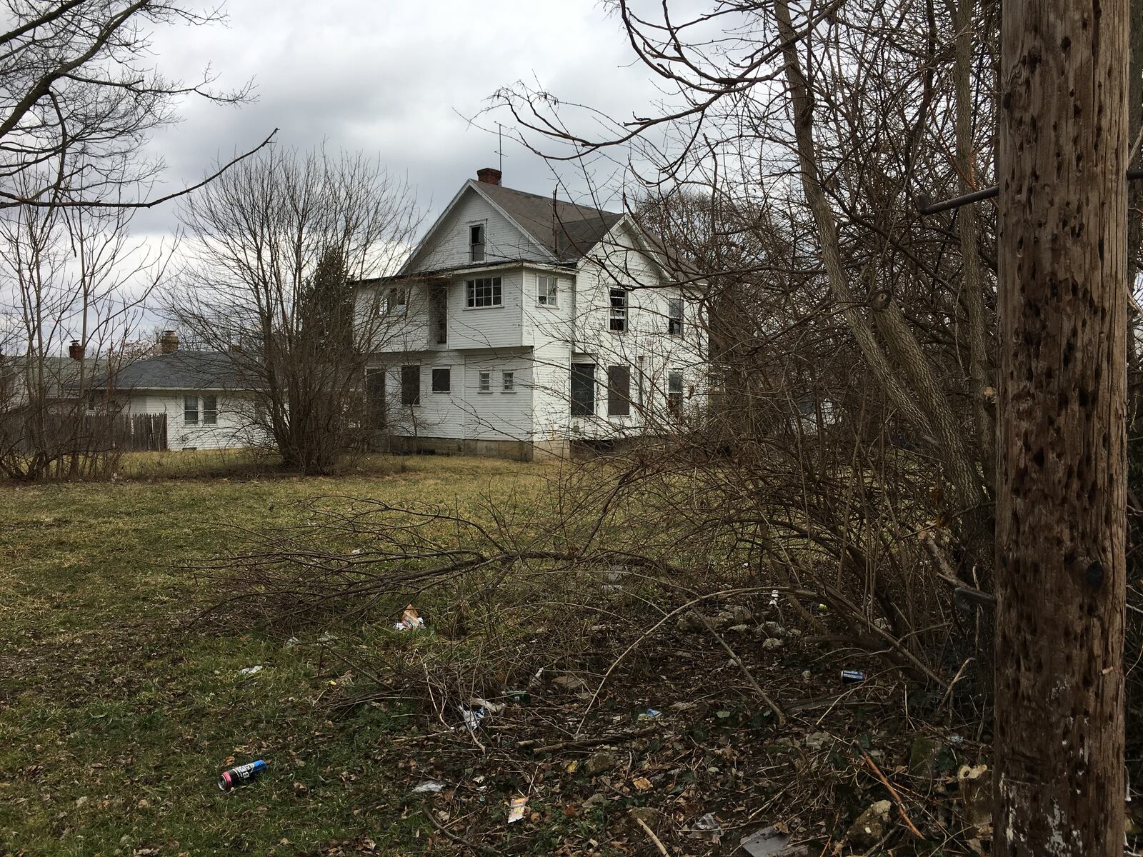 The body of Kathleen Driscoll, 31, of Dayton was found wrapped in blue cloth and taped on Jan. 12, 2018 in this vacant lot at 39 Ernst Ave., DaytonThe cause of death is pending. STAFF Lynn Hulsey