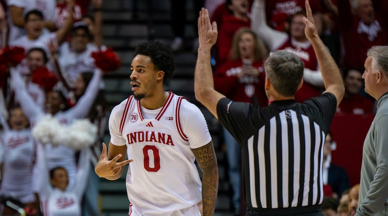 Indiana guard Jasai Miles (0) reacts after scoring during the first half of an NCAA college basketball game against Purdue, Tuesday, Jan. 27, 2026, in Bloomington, Ind. (AP Photo/Doug McSchooler)