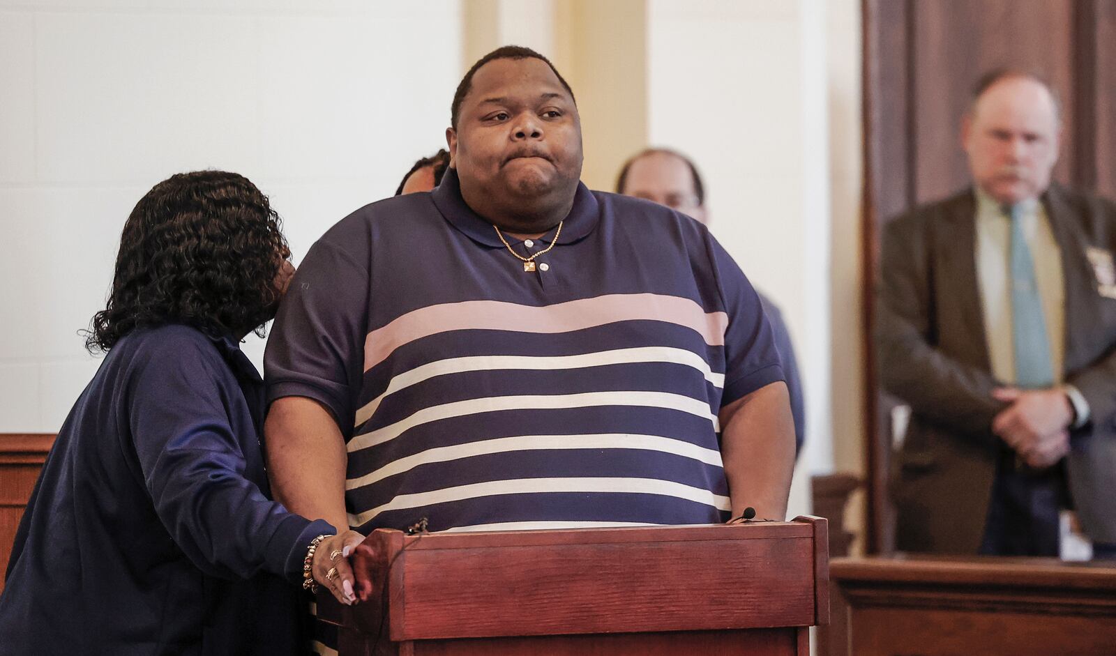 Mario Hall, the son of Lo-Letha "Letha" Toland-Hall prepares to speak during the sentencing of William Brock at the Clark County Common Pleas Court on Friday, Jan. 30, 2026, in Springfield. The hearing was continued to Monday after Brock's attorney, Jon Paul Rion, collapsed in the courtroom. JOSEPH COOKE / STAFF